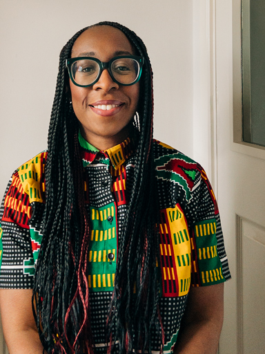 Photo portrait of Shirleena, smiling, looking confidently at the reader.