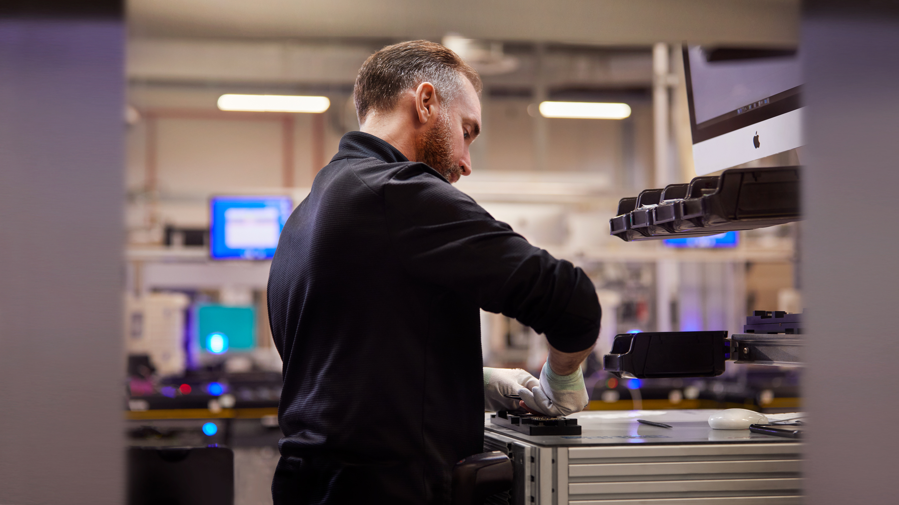 Apple Cork employee working in a lab.