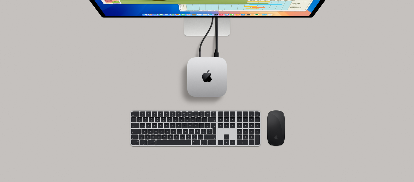 Una Mac mini con un Studio Dsplay, un Magic Keyboard y un Magic Mouse