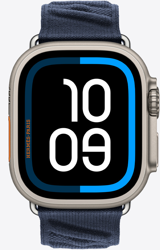 Front view of the new Apple Watch Hermès Ultra 2 showing the new Maritime watch face and En Mer band in Bleu Nuit (blue).