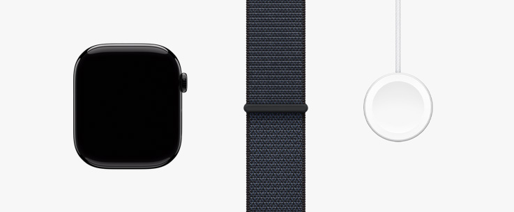 Une Apple Watch Series 10 vue de face, un bracelet sport à rabat de couleur encre et un câble de recharge rapide magnétique USB-C, placés côte à côte.