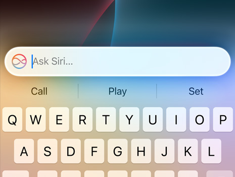 A close up of a cursor making a Siri request.