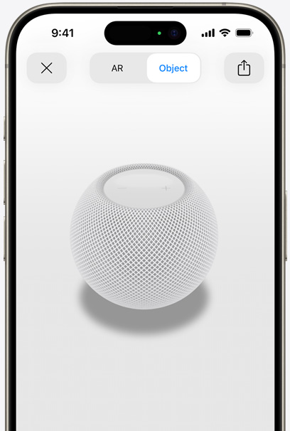 HomePod สีขาวบนหน้าจอของ iPhone ในมุมมองแบบ AR