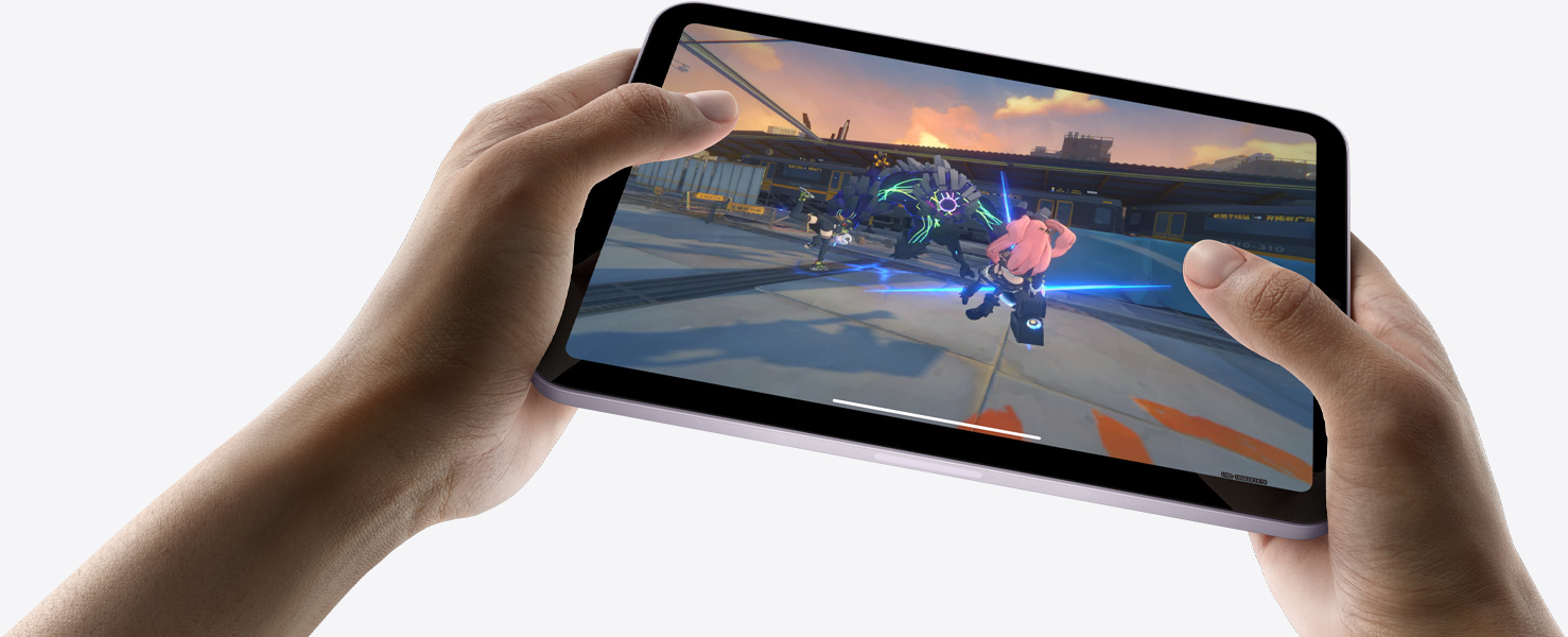 iPad mini held by a user’s hands in landscape view playing a graphically intense game.